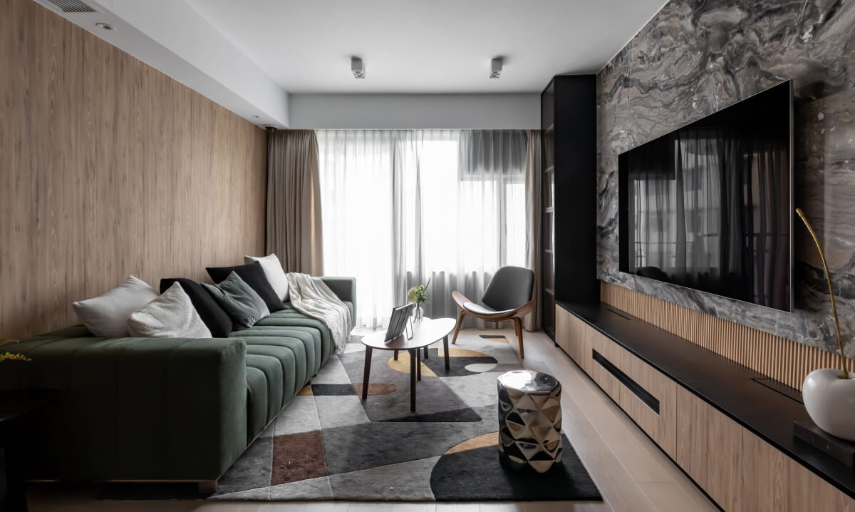 Bedroom with a window-side sitting area in a house
