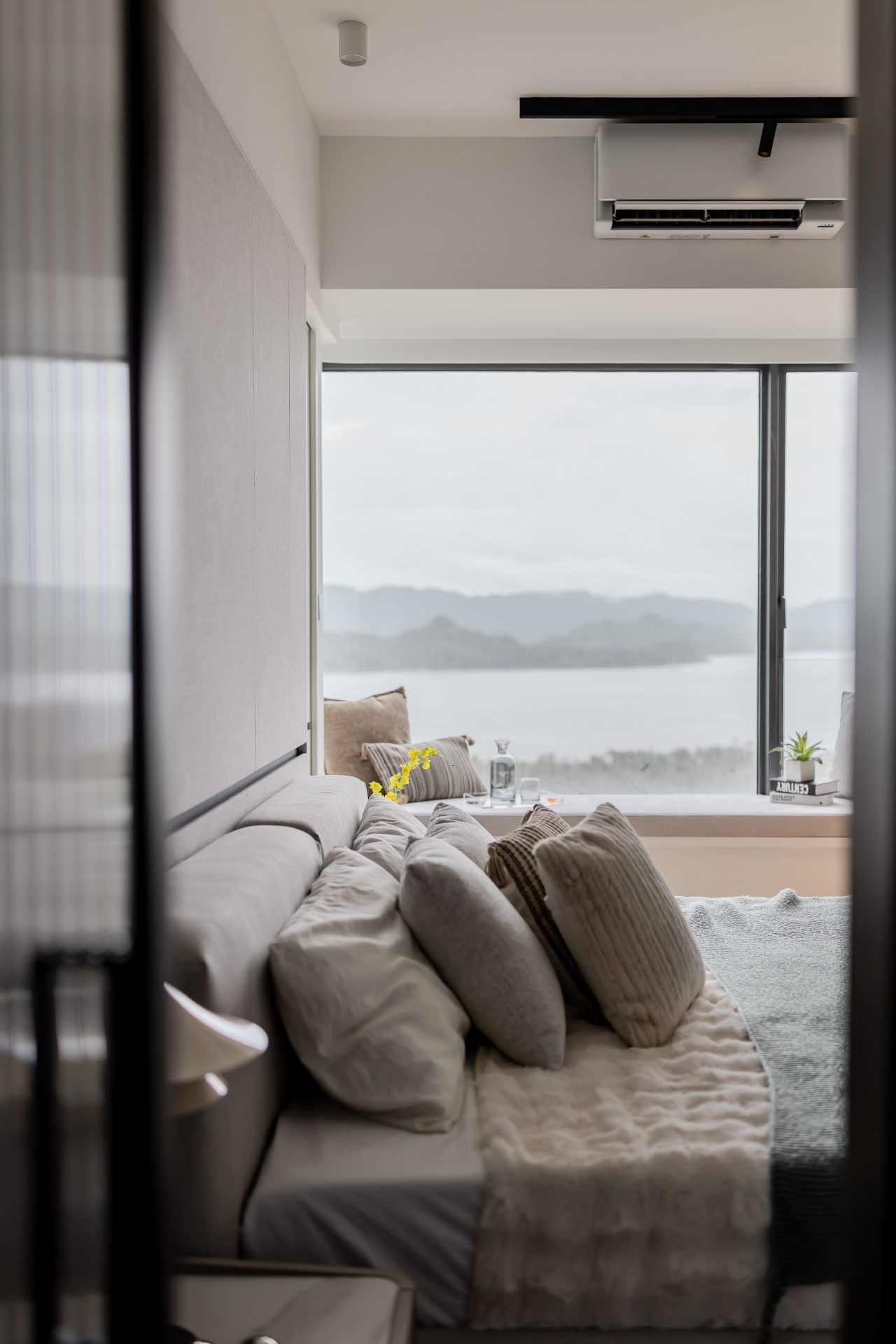 Double Cove — bedroom window seat overlooking the waterfront